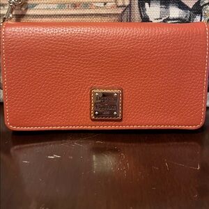 Dooney & Bourke burnt orange pebble leather crossbody / wallet Shoulder Bag.